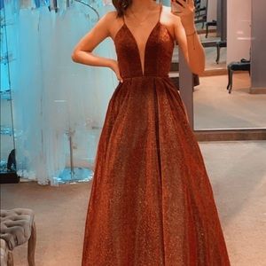 Red sparkly ball gown prom dress